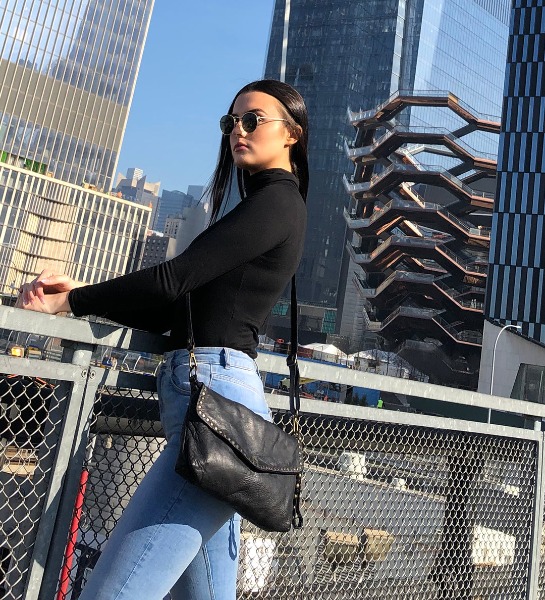 Aria Envelope Crossbody in Black with Studs on model