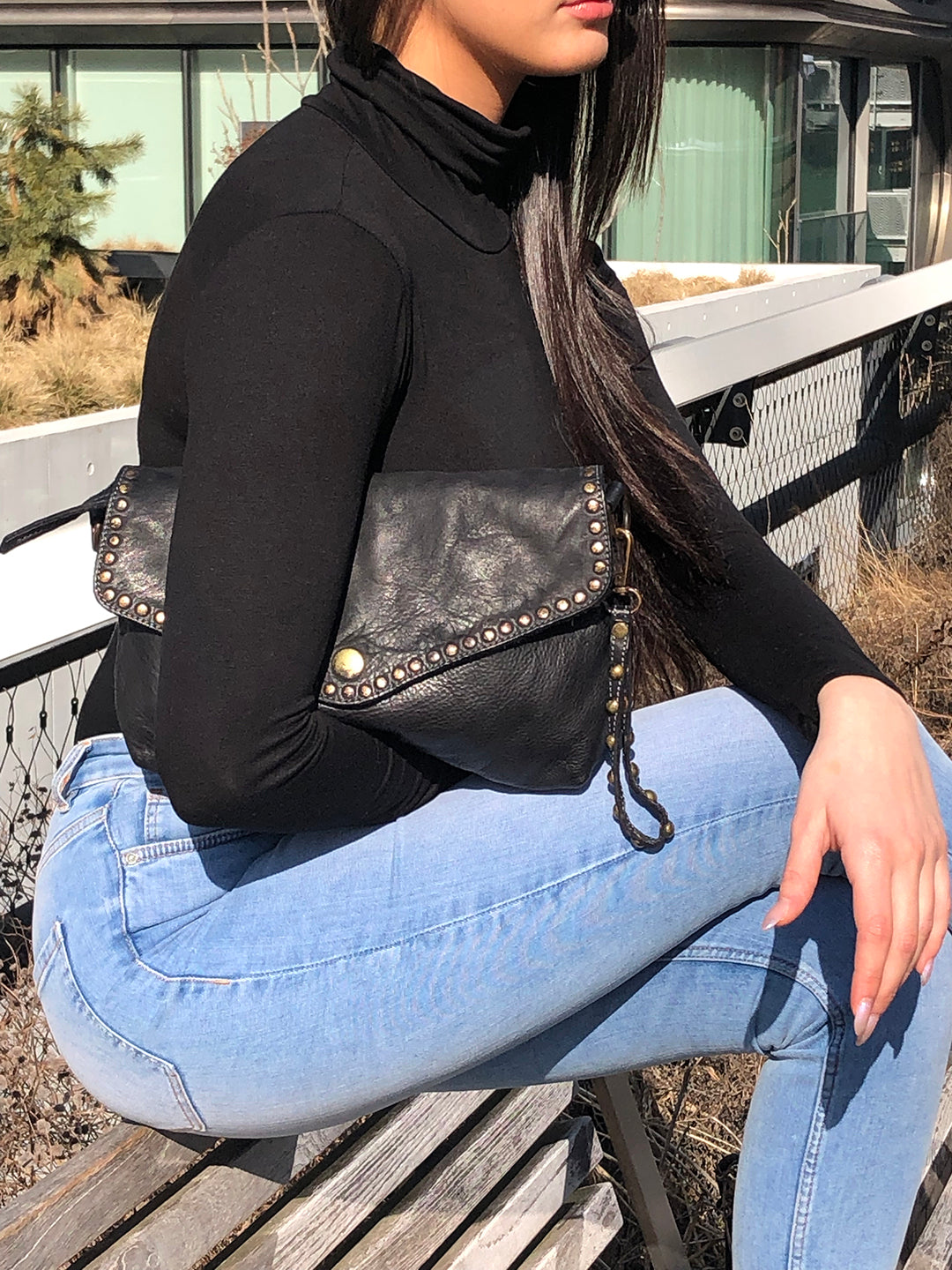 Aria Envelope Crossbody in Black with Studs on model